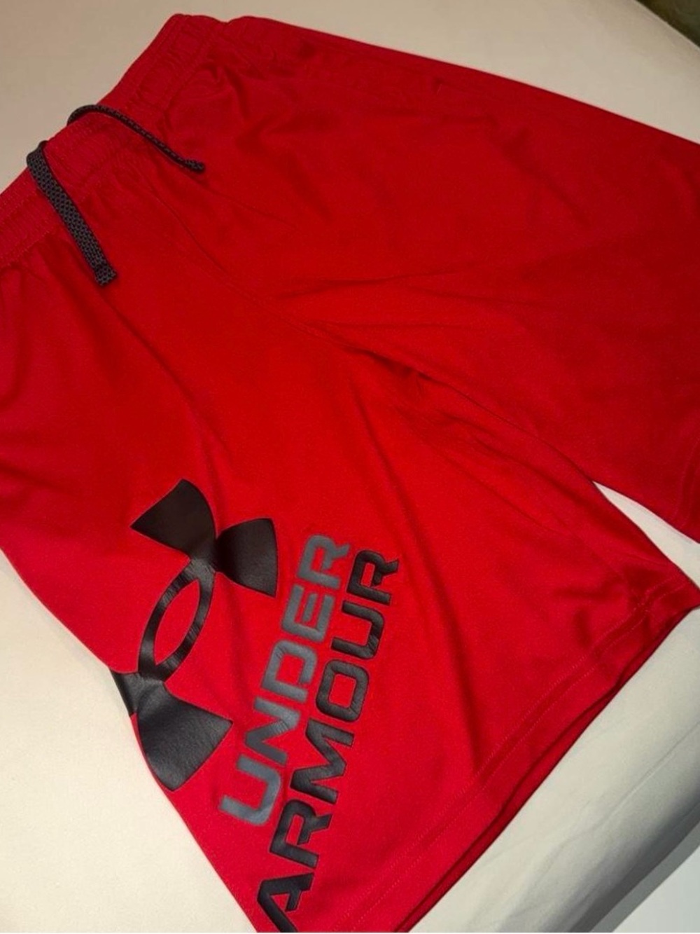 Under Armour kids Red Athletic Shorts with Black Logo